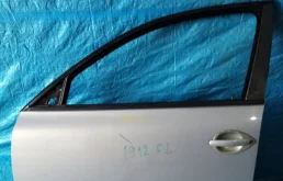 Дверь передняя левая для Volkswagen Passat 2001 года на фотографиях