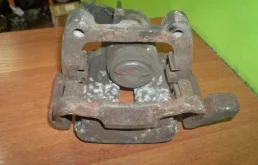 Суппорт задний левый для Skoda Octavia на фотографиях