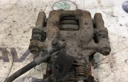 Суппорт задний левый для Skoda Octavia на фотографиях