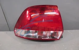 Фонарь левый для Volkswagen Polo 2013 года на фотографиях