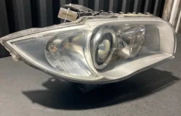 Фара ксенон левая для BMW 1er 2009 года на фотографиях