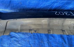 Бампер для Nissan X-Trail 2005 года на фотографиях