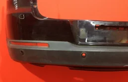 Фартук (спойлер) заднего бампера для Volkswagen Tiguan 2010 года на фотографиях