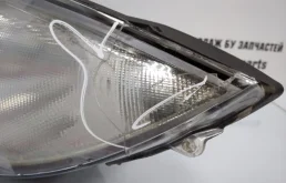 Фара левая для BMW 1er 2010 года на фотографиях