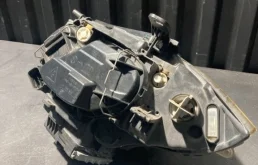 Фара ксенон левая для BMW 1er 2009 года на фотографиях