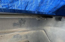 Бампер для Nissan X-Trail 2005 года на фотографиях