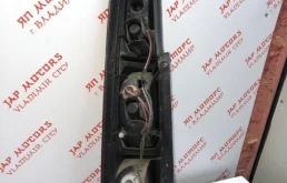 Фонарь внешний правый для Nissan X-Trail 2005 года на фотографиях