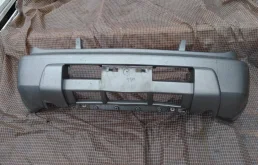 Бампер для Nissan X-Trail 2005 года на фотографиях