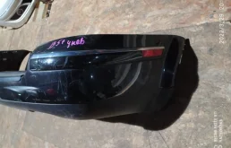 Бампер задний для Volkswagen Passat 2001 года на фотографиях