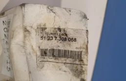 Замок капота левый для BMW X5 на фотографиях