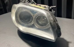 Фара ксенон левая для BMW 1er 2009 года на фотографиях