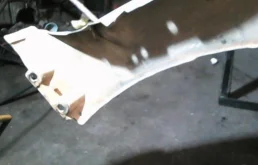 Крыло левое для Nissan X-Trail 2003 года на фотографиях