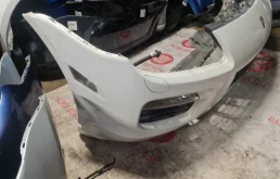 Бампер передний для Porsche Cayenne 2009 года на фотографиях