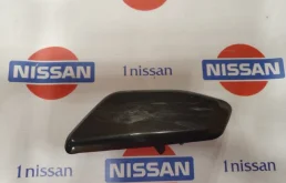 Крышка форсунки фароомывателя левая для Nissan X-Trail 2018 года на фотографиях