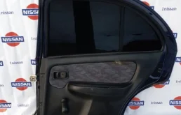 Двери для Nissan Almera 1997 года на фотографиях