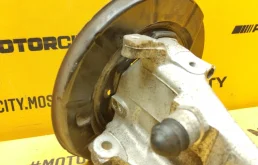 Кулак поворотный левый для BMW 5er 1997 года на фотографиях