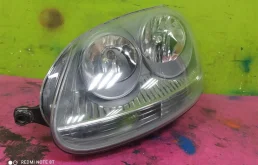 Фара ксенон левая для Volkswagen Jetta 2009 года на фотографиях