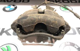 Суппорт передний левый для Skoda Octavia 2013 года на фотографиях