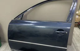 Дверь передняя левая для Volkswagen Passat 2001 года на фотографиях
