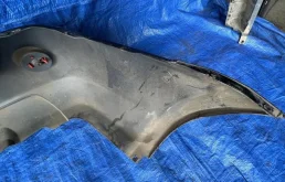 Бампер для Nissan X-Trail 2005 года на фотографиях