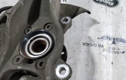 Кулак поворотный левый для Volvo XC90 2017 года на фотографиях