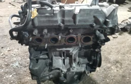 Двигатель без навесного для Mazda Familia 2007 года на фотографиях