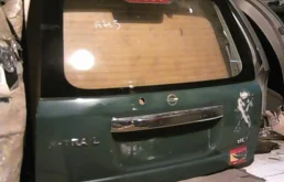 Двери для Nissan X-Trail 2006 года на фотографиях