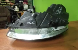 Фара ксенон левая для Volkswagen Jetta 2009 года на фотографиях