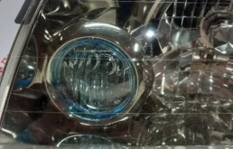 Фара левая для Nissan X-Trail 2000 года на фотографиях