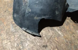 Подкрылок передний левый для Volkswagen Passat 2010 года на фотографиях