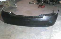 Бампер задний для Nissan Almera 2002 года на фотографиях