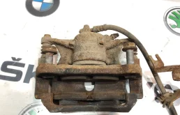 Суппорт передний правый для Skoda Octavia 2013 года на фотографиях