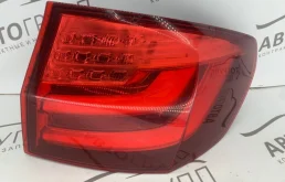 Фонарь левый для BMW 5er 2014 года на фотографиях