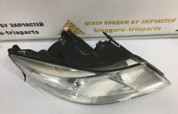 Фара ксенон левая для Skoda Octavia 2010 года на фотографиях
