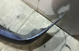 Бампер задний для Nissan Almera 2002 года на фотографиях