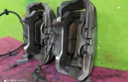 Суппорт передний левый для Audi A6 2015 года на фотографиях