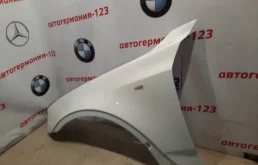 Крылья для BMW X3 2006 года на фотографиях