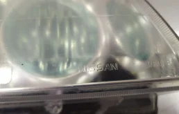 Фара ксенон левая для Nissan X-Trail 2004 года на фотографиях