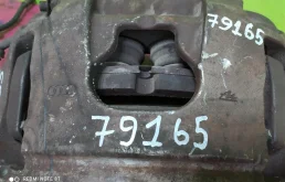 Суппорт передний левый для Audi A6 2010 года на фотографиях