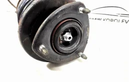 Амортизатор передний правый для Suzuki Grand Vitara 2007 года на фотографиях