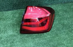 Фонарь внешний правый для BMW 3er 2014 года на фотографиях