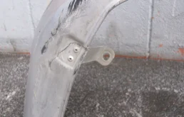 Накладка переднего бампера для Suzuki Liana 2005 года на фотографиях