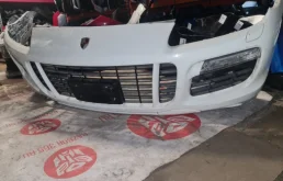 Бампер передний для Porsche Cayenne 2009 года на фотографиях