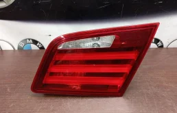Фонарь внутренний левый для BMW 5er 2014 года на фотографиях