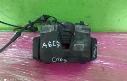 Суппорт передний левый для Audi A6 2010 года на фотографиях