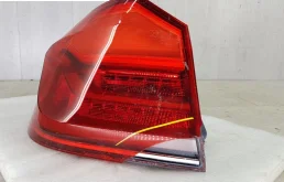 Фонарь внешний левый для BMW 5er 2014 года на фотографиях