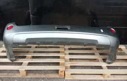 Бампер задний для Nissan X-Trail 2000 года на фотографиях