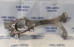 Кулак поворотный левый для Audi A6 2008 года на фотографиях