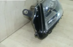 Фара ксенон левая для Volkswagen Passat 2012 года на фотографиях