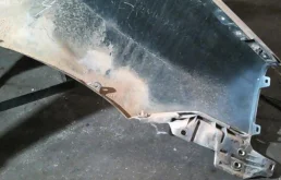 Крыло левое для Nissan X-Trail 2003 года на фотографиях